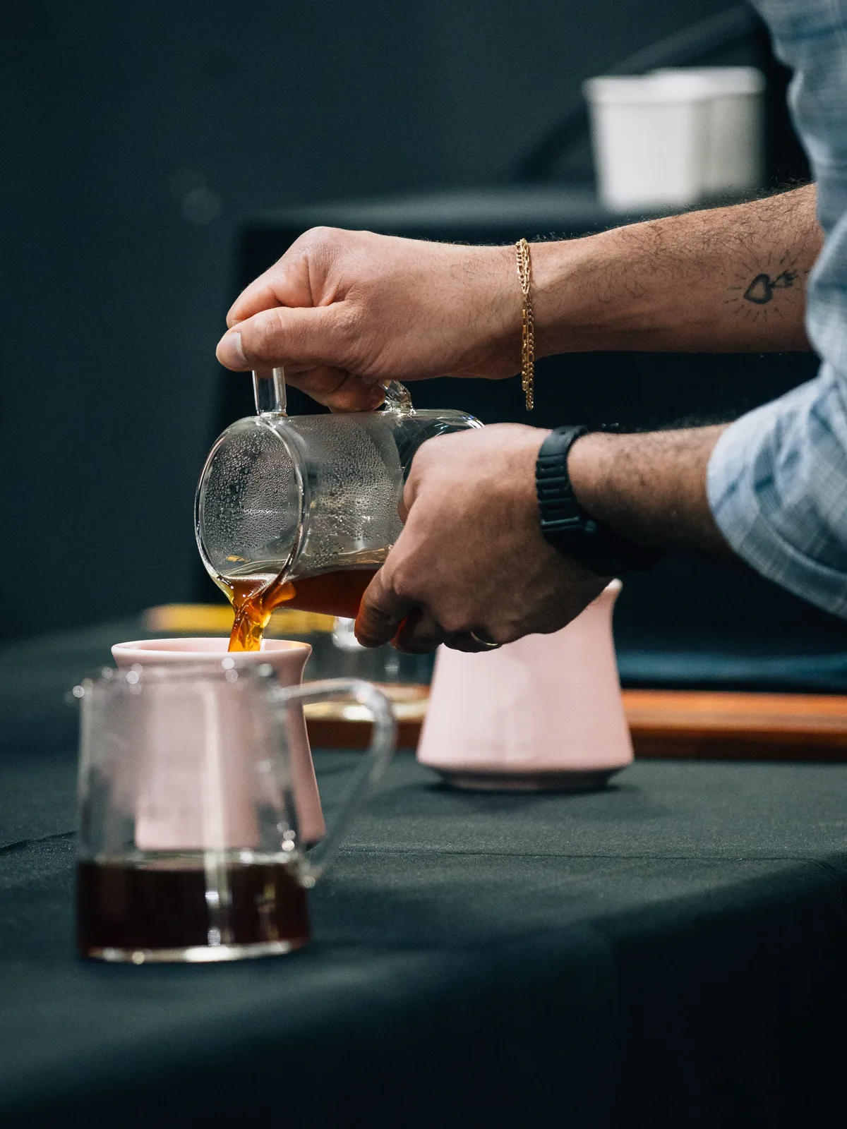 Hands preparing coffee